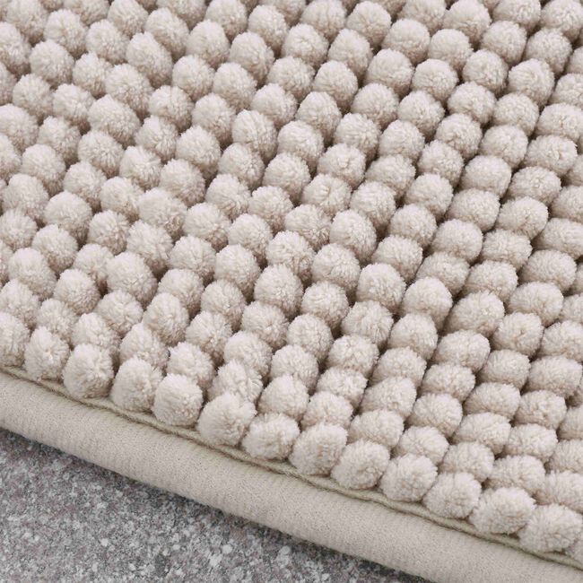 CATHERINE LANSFIELD EXTRA LONG BOBBLE BATH MAT NATURAL