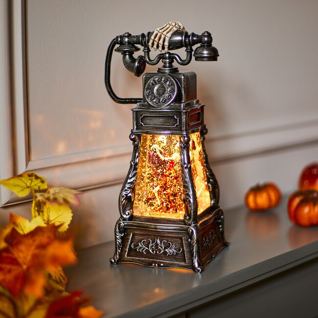 Halloween Swirling Glitter Phone with Skeletons